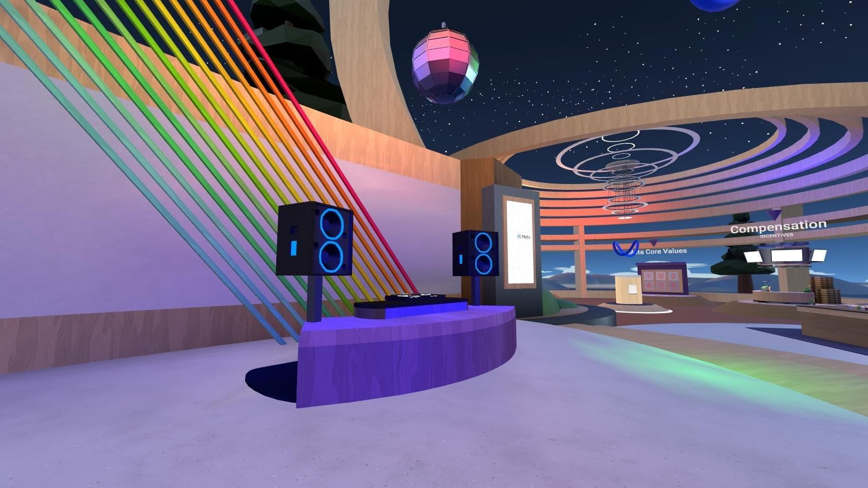 The DJ booth with a disco ball and lighting effects